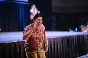 Picture of teacher Emily waving