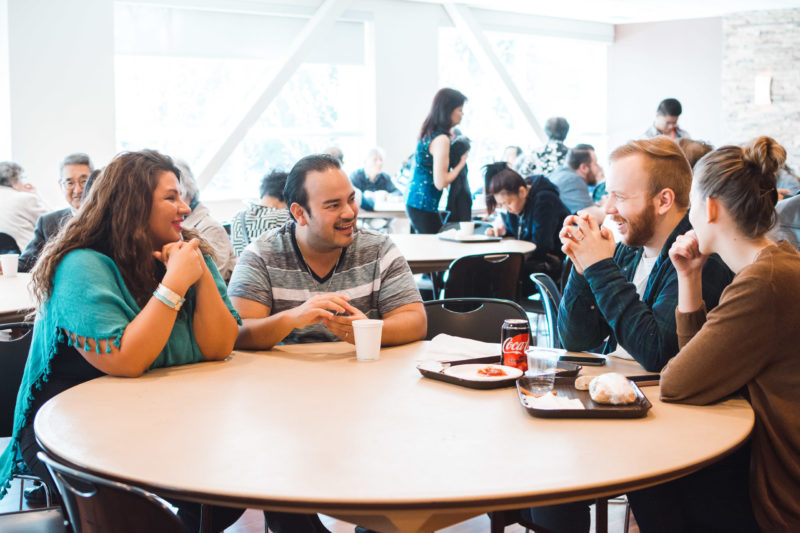 Photo of people talking in the cafe