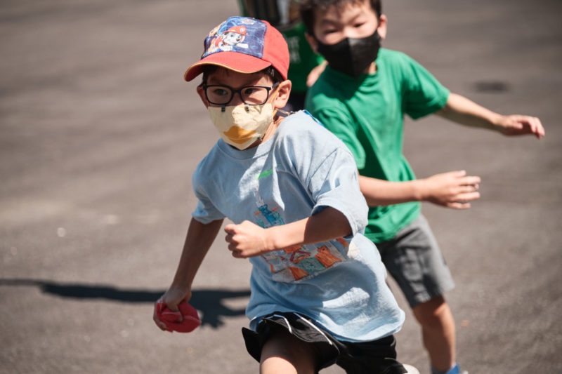 photo of kids playing tag